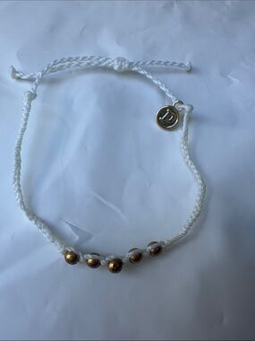 NWOT Pura Vida White Braided Bracelet with Gold Beads